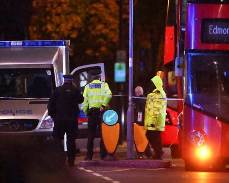British police detain man after car crashes into police station