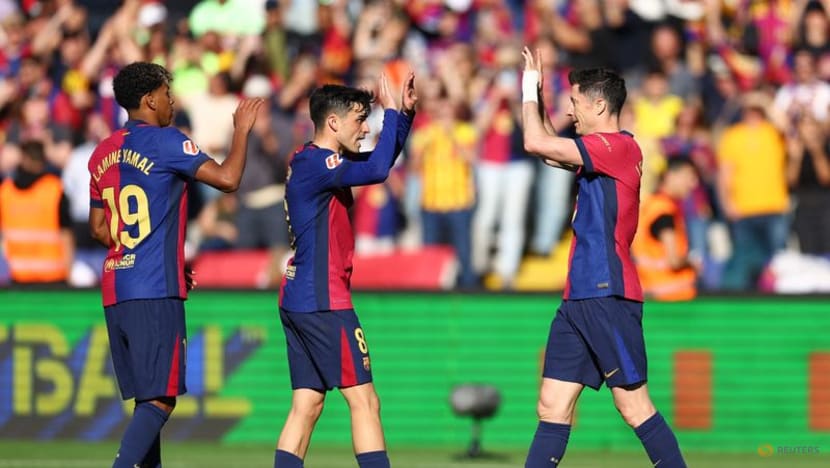 Lewandowski strikes twice as Barcelona beat Girona to take LaLiga lead