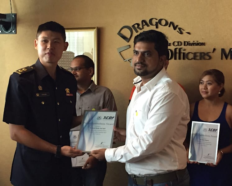 16 honoured for rescuing man pinned under trailer truck