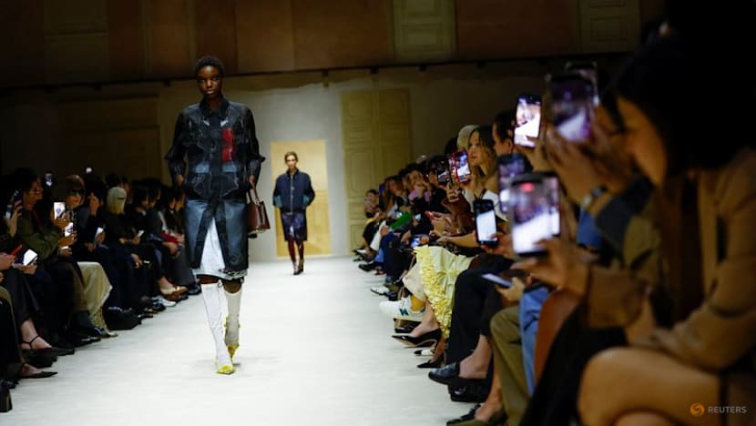 Prada layers winter jackets over light dresses at Milan show as Zuckerberg's presence fuels smart glasses talk