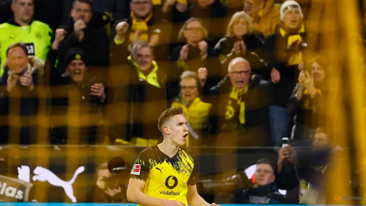 Dortmund confirmed Bundesliga runners-up 3-2 with win over Frankfurt