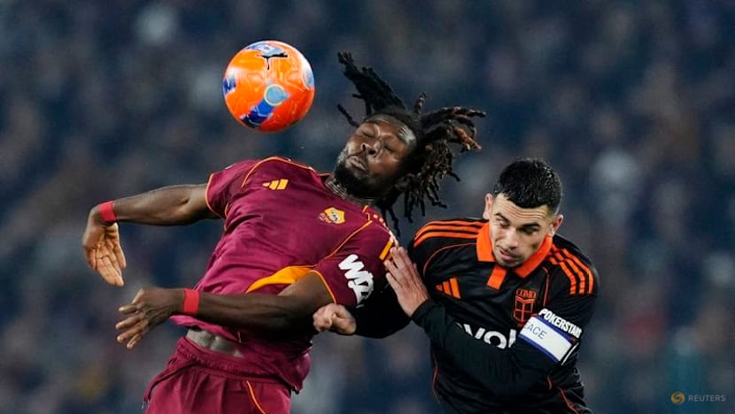 Roma remain in title hunt with 1-0 win over Como