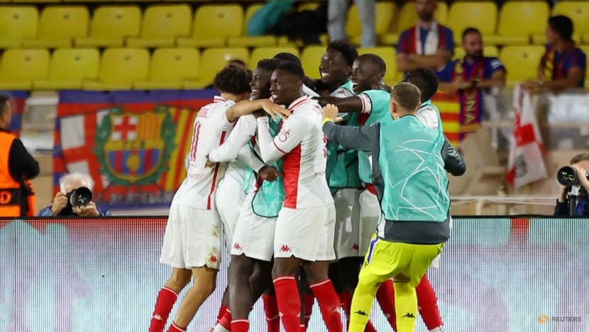 Ten-man Barcelona lose 2-1 to Monaco in Champions League opener