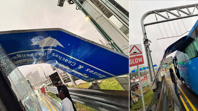 往兀兰关卡的长堤路段 路牌坠落交通一度被堵