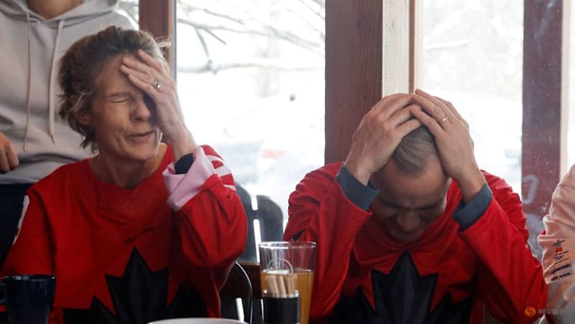 Ice hockey-US claim long-awaited gold by beating rivals Canada in overtime thriller