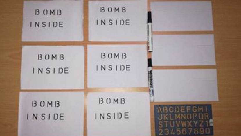 Man who sent fake bomb threats to Parliament House and police unit is jailed for 6 months
