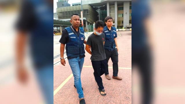 新马警方捣毁跨境电信诈骗团伙 涉案男子从马国引渡回新面控