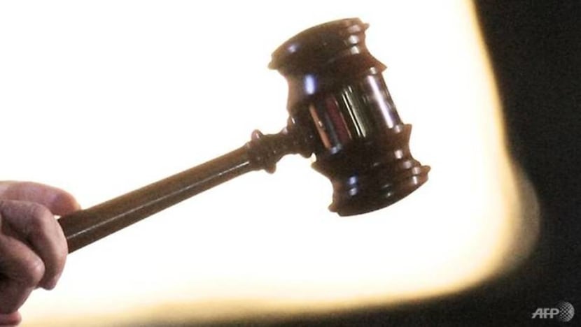 Woman who used fake invoices to cheat companies of S$25m gets 10 years' jail Woman who used fake invoices to cheat companies of S$25m gets 10 years' jail