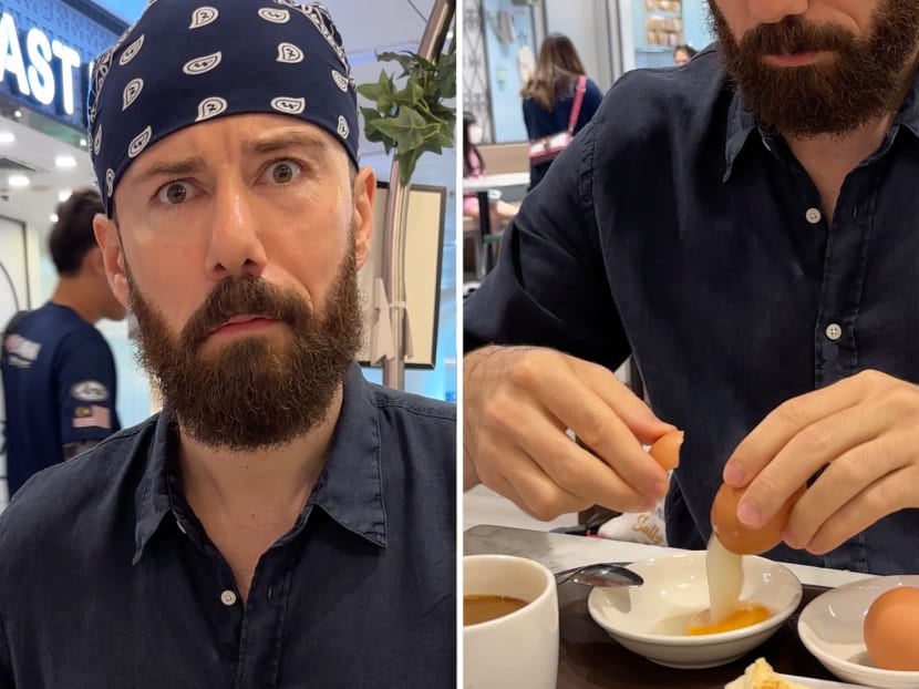 Screenshots from a video of a United States-based food vlogger looking shocked after seeing the soft-boiled eggs included in a kaya toast set in Singapore.