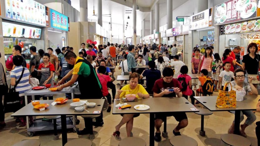 Selected coffee shops, hawker centres to accept 10 e-payment schemes by end-2018