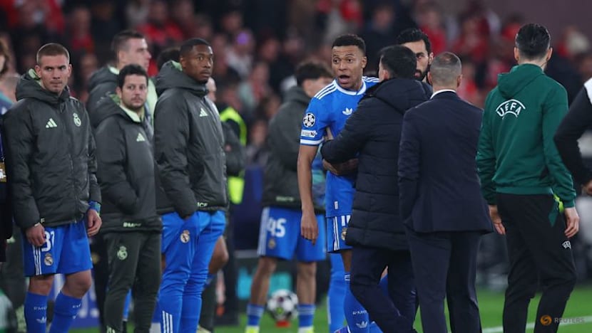 Vinicius earns Real 1-0 win at Benfica in match marred by racism row