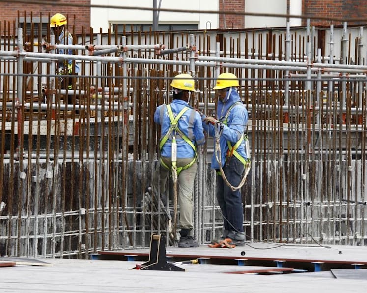 Employers of non-Malaysian transfer work permit holders can share Covid-19-related costs: MOM