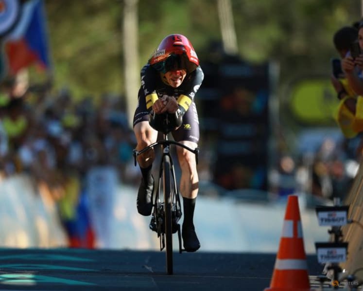 Vingegaard closes difficult chapter as he dons Tour yellow jersey