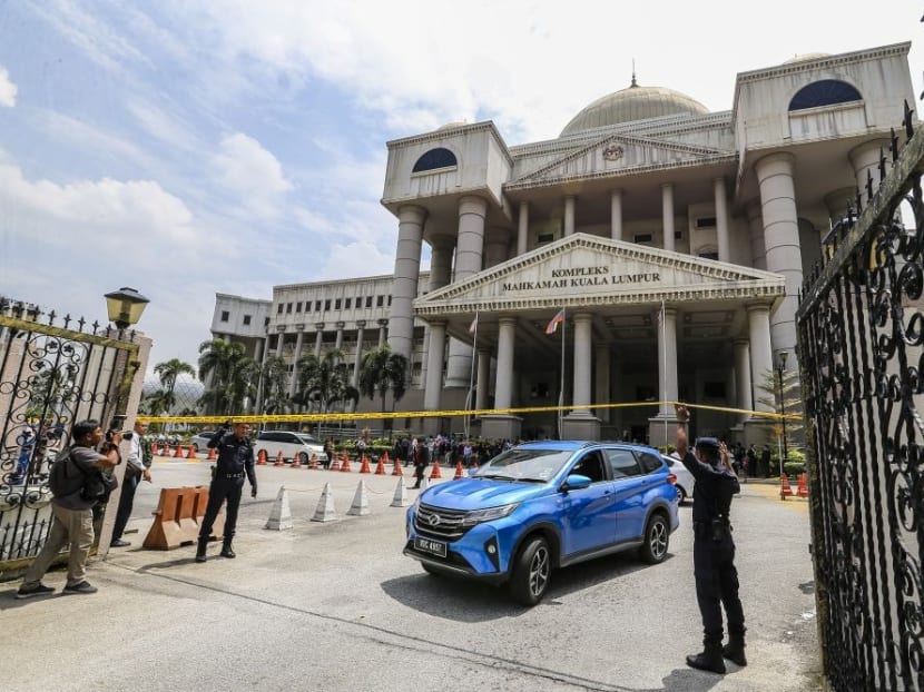 Police cordon off the Kuala Lumpur Court Complex with yellow tape following a bomb threat July 25, 2019. Police cordon off the Kuala Lumpur Court Complex with yellow tape following a bomb threat July 25, 2019.