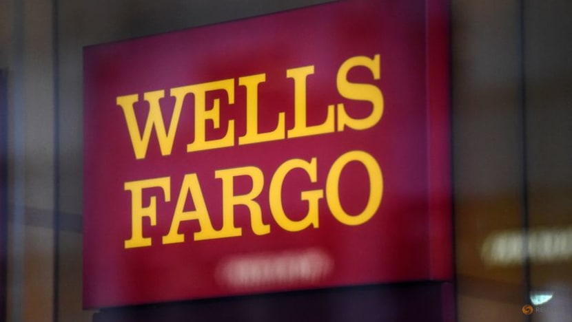 Wells Fargo suspends China travel after banker hit with exit ban
