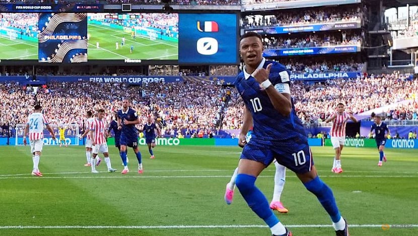 Mbappe keeps cool as France survive furnace against Paraguay