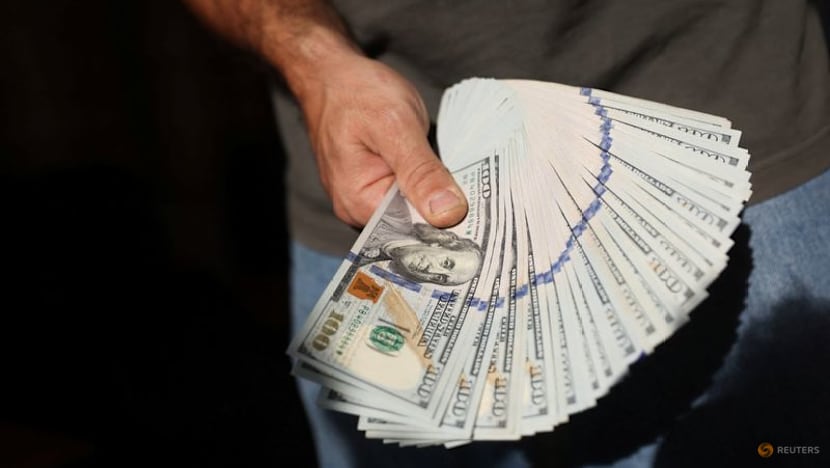 Dollar edges lower against yen in week packed with data releases and central bank decisions