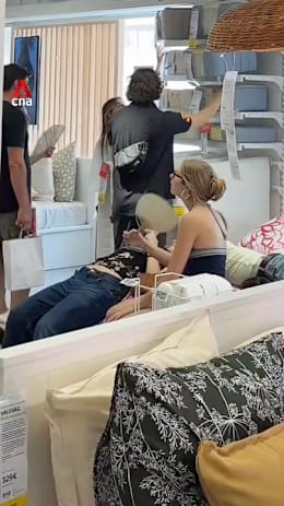 People in Paris lounge at IKEA to escape heatwave
