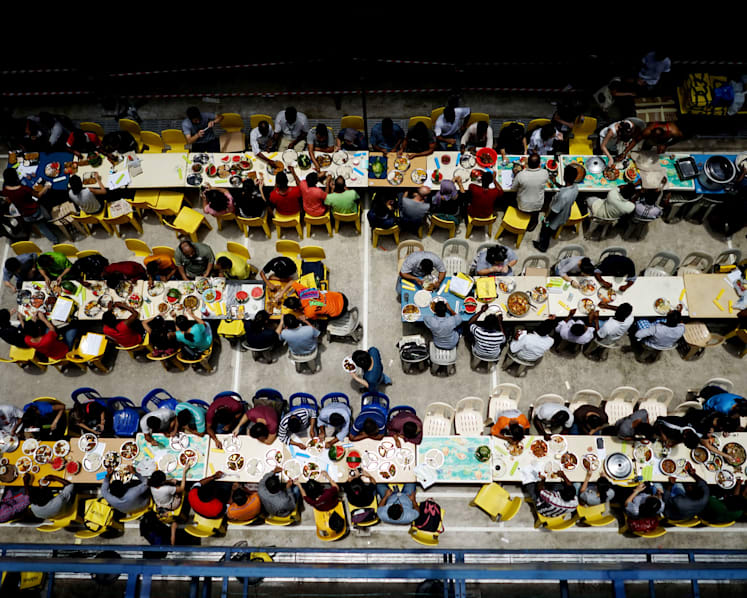 S’poreans team up with foreign workers to tackle tasty challenge