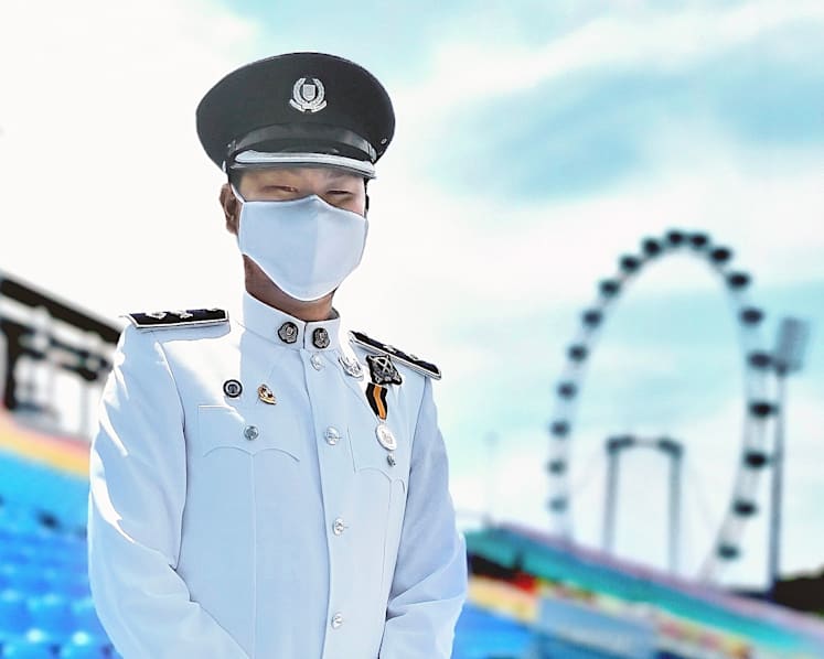 Participating in parade on National Day a family tradition for police officer