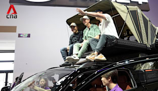 American YouTuber guides foreigners around Chinese EVs that US buyers can't get | Video