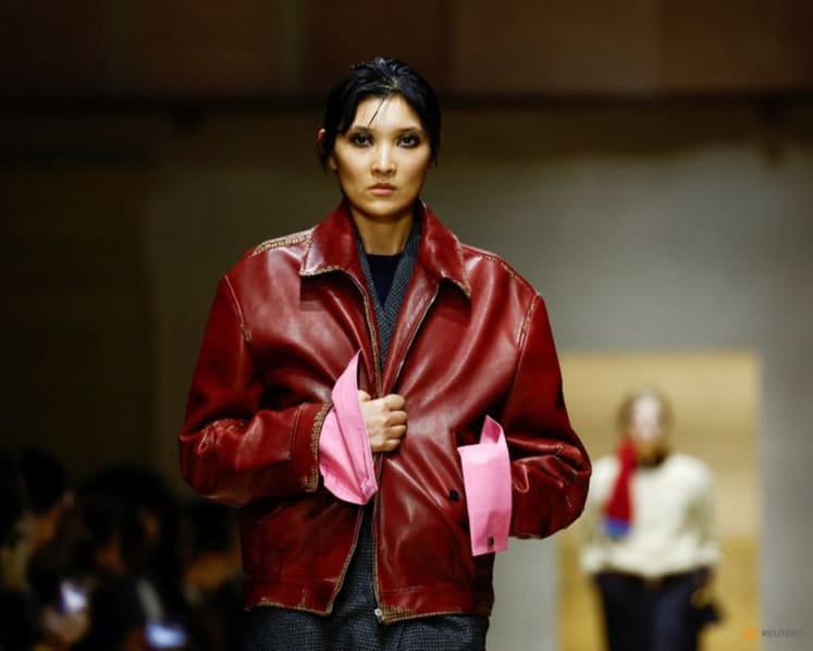 Prada layers winter jackets over light dresses at Milan show as Zuckerberg's presence fuels smart glasses talk
