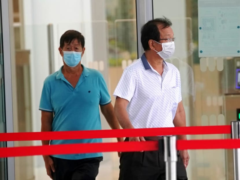 Cheng Lee Meng (right) outside the State Courts in August 2021. The court heard he asked his friend Ng Kiong Hoe (left) to accompany him to a restricted area in Lim Chu Kang. Cheng Lee Meng (right) outside the State Courts in August 2021. The court heard he asked his friend Ng Kiong Hoe (left) to accompany him to a restricted area in Lim Chu Kang.