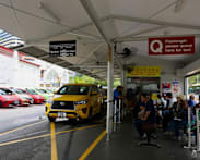 'Too expensive' or 'fair price' for convenience? Day 1 of cross-border taxi scheme elicits mixed reactions