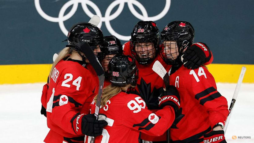 Ice hockey-Canada into semis, with Poulin back from injury and equalling scoring record