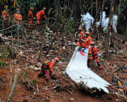 US report into China Eastern crash suggests fuel cut, cockpit struggle