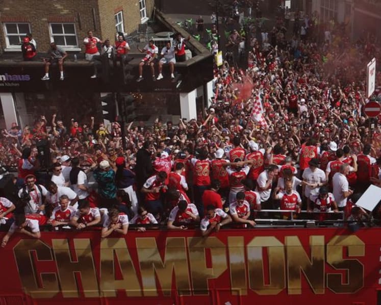 Arsenal paint London red with victory parade after Premier League title win