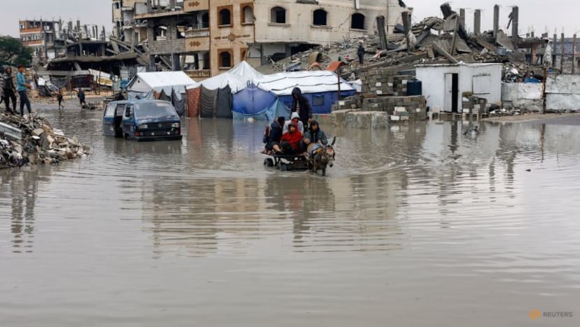 Gaza families struggle to recover from days of torrential rains that killed 12 people