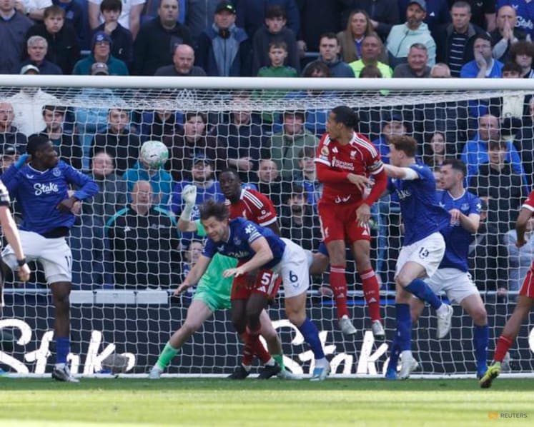 Liverpool's Van Dijk scores late winner in 2-1 derby win over Everton