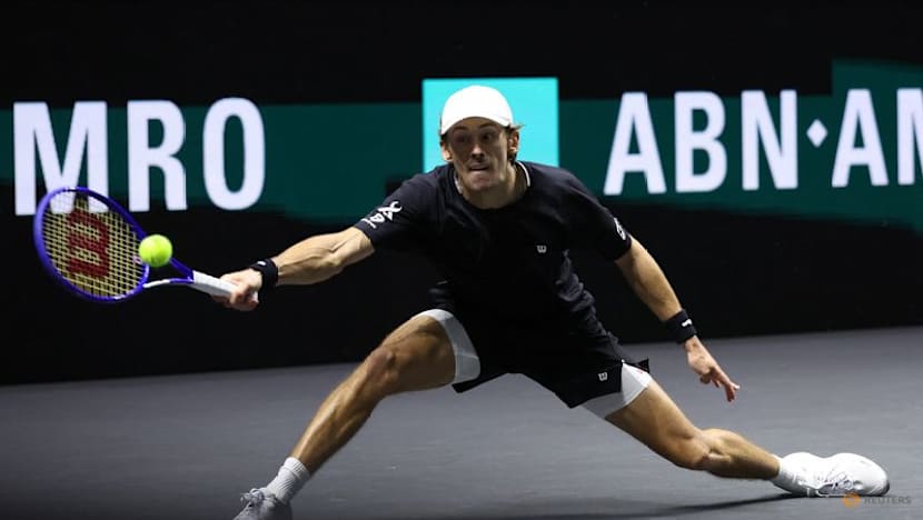 Third time lucky De Minaur dominates Auger-Aliassime to win Rotterdam Open