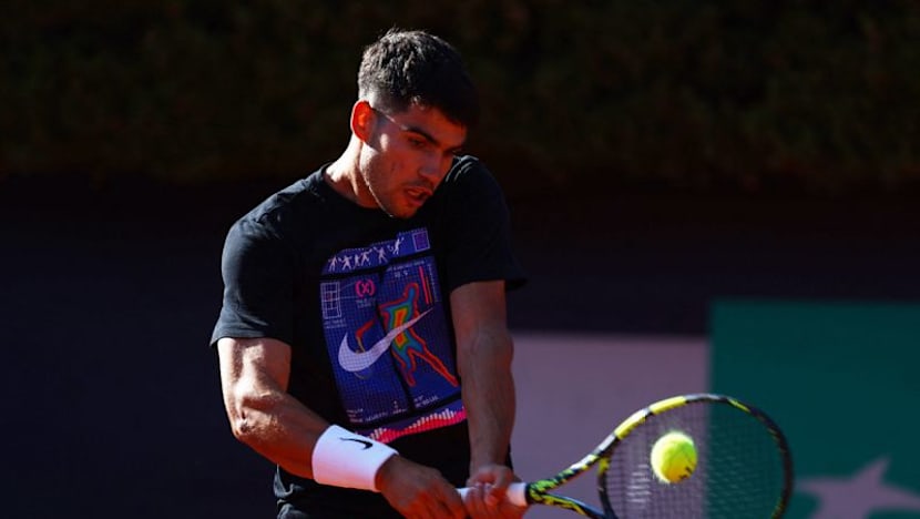 Alcaraz overcomes teething trouble on tweaked serve to beat Michelsen in Tokyo