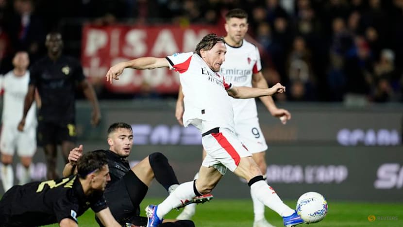 Modric nets late winner as Milan survive scare at Pisa
