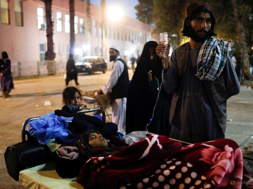 An Afghan woman injured during the recent earthquake receives treatment at a hospital compound in Herat, Afghanistan, on Oct 11, 2023.
