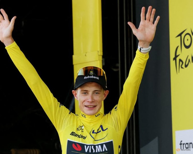 Vingegaard closes difficult chapter as he dons Tour yellow jersey