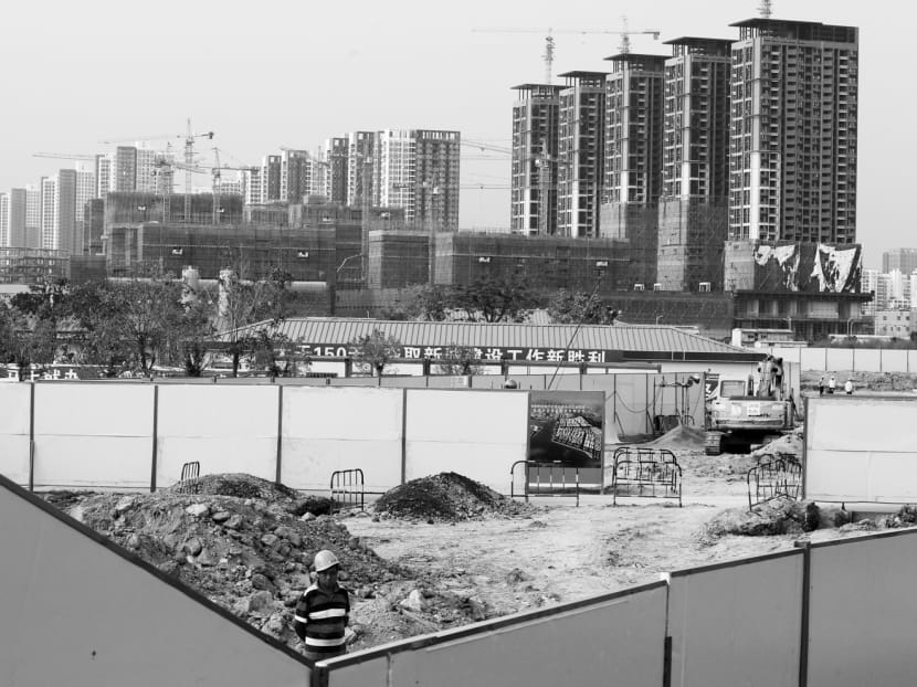 High-rise residential flats under construction in China’s southern city of Shenzhen. Property prices in Shenzhen have jumped 76 per cent since the start of last year. PHOTO: REUTERS