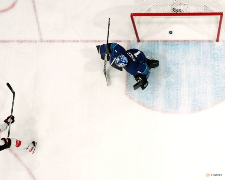 Ice hockey-Switzerland into semis after Muller goal downs Finland