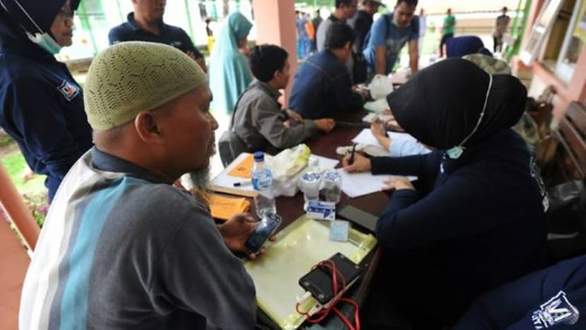 Tsunami Indonesia: Gambar, ujian DNA bantu kenal pasti keluarga