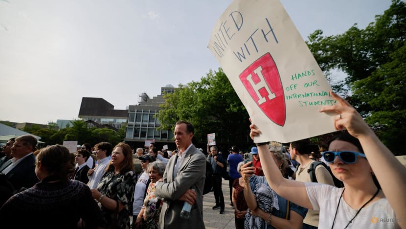 Harvard students march after Trump seeks to cut remaining contracts