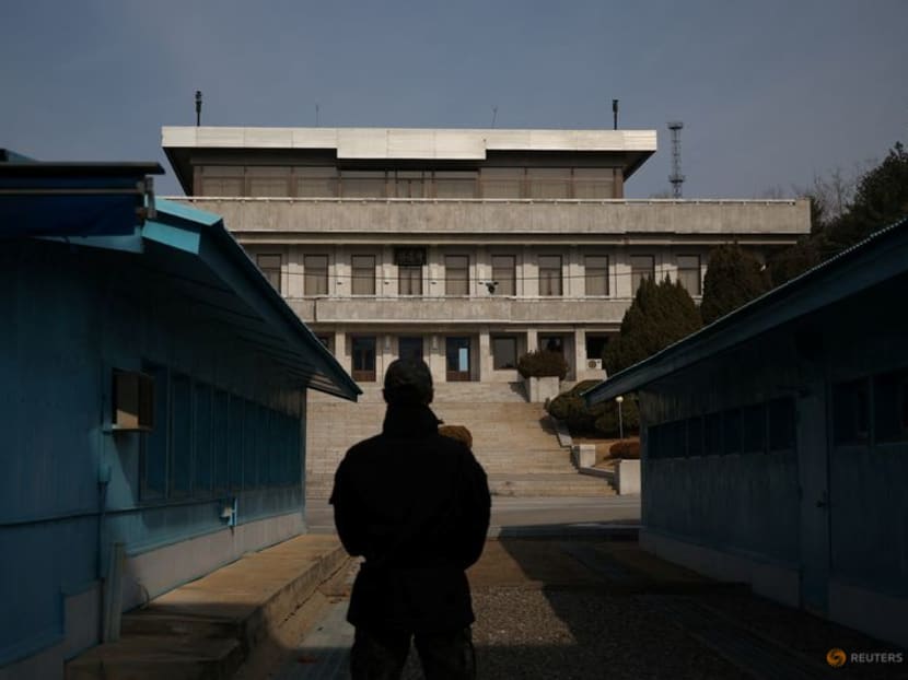 FILE PHOTO: A South Korean soldier stands guard in the truce village of Panmunjom inside the demilitarized zone (DMZ) separating the two Koreas, South Korea, February 7, 2023.   REUTERS/Kim Hong-Ji/File photo