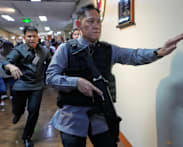 Gunshots fired in standoff at Philippine Senate over ICC suspect 