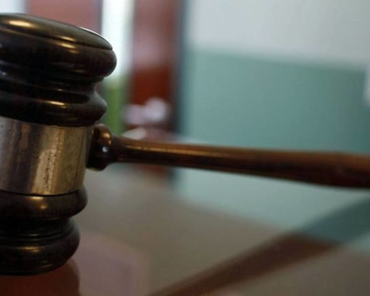 Woman charged with attempting to bribe police officer, assaulting two others and flouting COVID-19 regulations