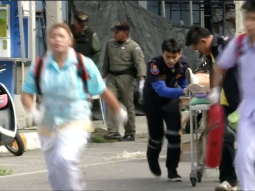 Rescuers and medical officers push an injured person on a gurney at the site of a bomb blast in Hua Hin, south of Bangkok, on August 12, 2016. PHOTO: Reuters