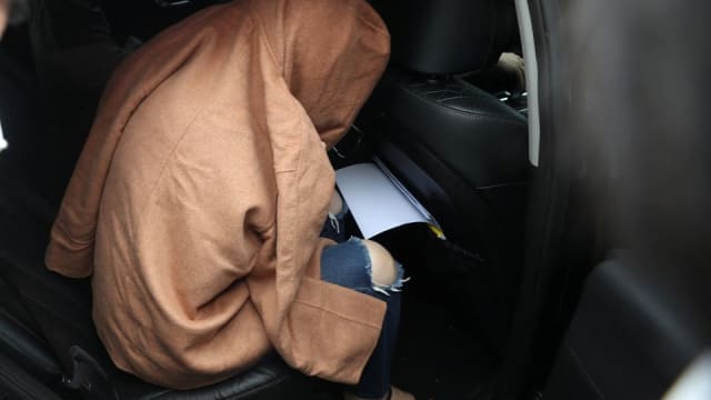 新西兰行李箱藏尸案 韩国法院把嫌犯移交给新西兰警方
