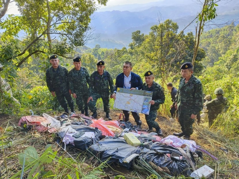 This handout photo taken and released on Dec 17, 2023 by the Royal Thai Army's Pha Muang Task Force shows members of the Pha Muang Task Force and Thai security personnel with confiscated bags of amphetamine tablets, following a clash with suspected drug traffickers in Chiang Rai province's Mae Fah Luang district in northern Thailand. This handout photo taken and released on Dec 17, 2023 by the Royal Thai Army's Pha Muang Task Force shows members of the Pha Muang Task Force and Thai security personnel with confiscated bags of amphetamine tablets, following a clash with suspected drug traffickers in Chiang Rai province's Mae Fah Luang district in northern Thailand.