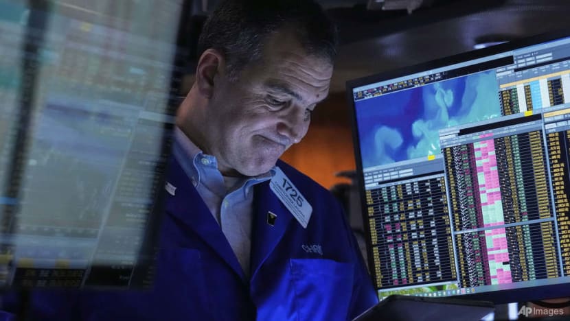 Wall St ends whipsaw week higher as Fed comments soothe market