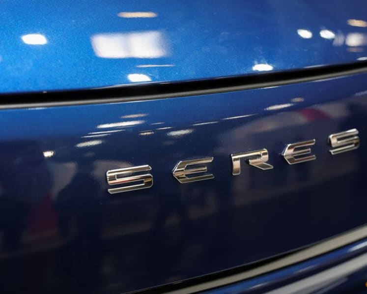 Huawei's Chinese EV partner Seres' shares slide in Hong Kong debut amid tech slump
